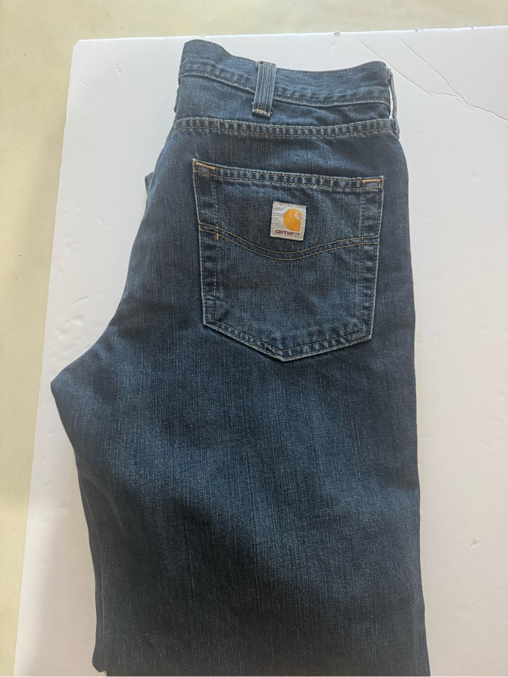 Carhartt Men’s Relaxed Jeans in Dark Blue with Gold Logo
